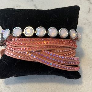 Touchstone Crystal peach wrap and pale pink ice bracelets.
